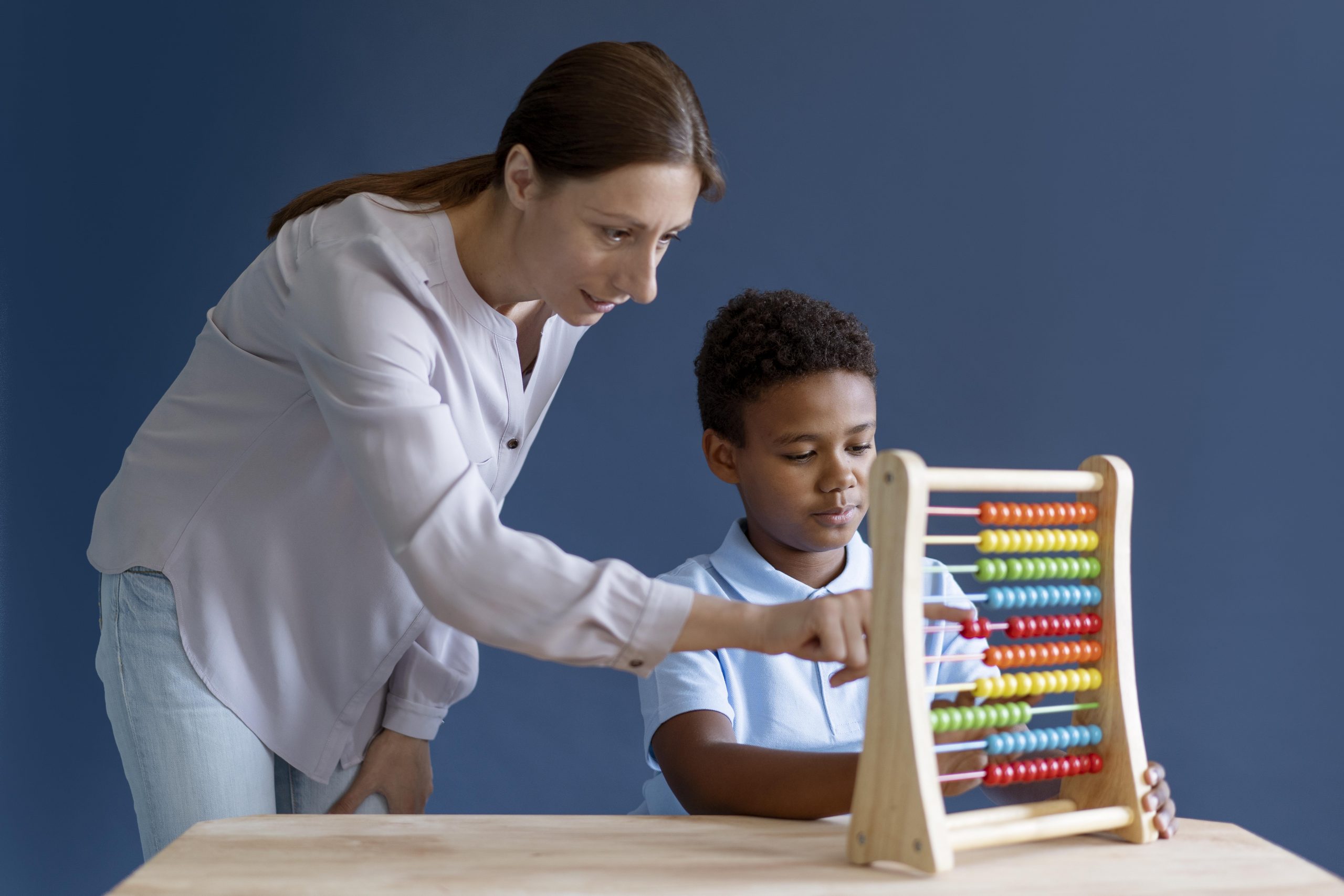 little-boy-having-occupational-therapy-session-with-psychologist